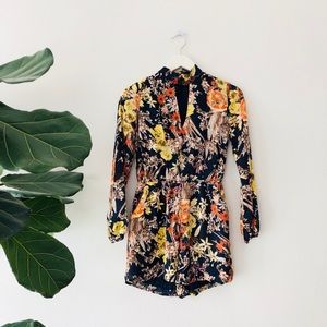 Floral long sleeve romper w/ v-neck opening